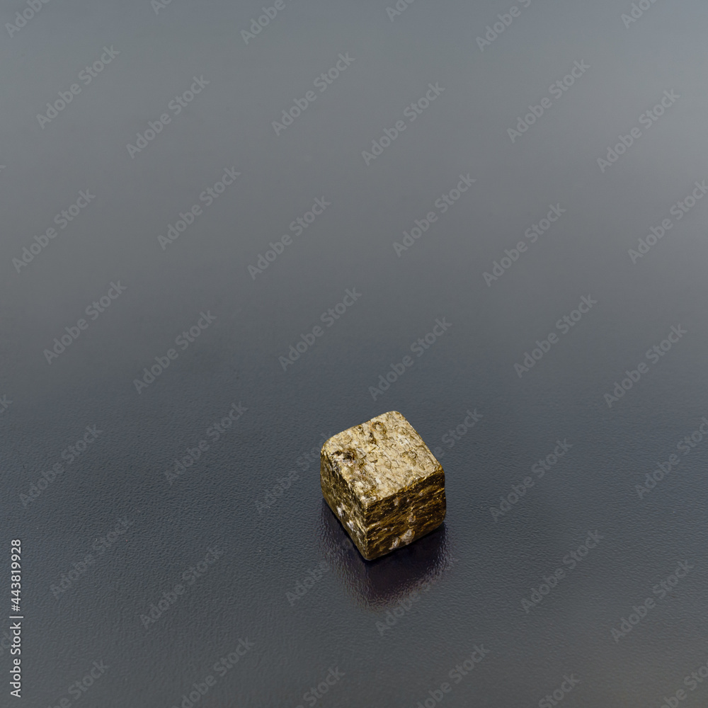 pyrite cube with dark background pyrite cube with dark background