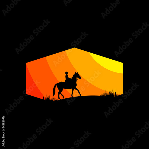 Black horse silhouette logo on sunset background