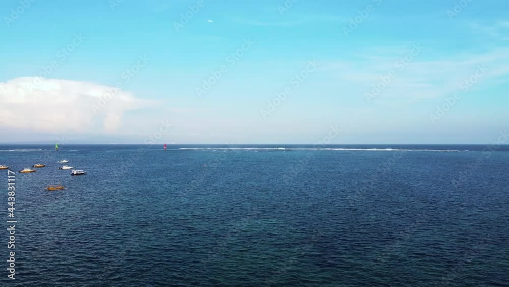 Static aerial view on lighthouses boats and ocean near to Sanur beach Bali Indonesia. High quality 4k footage Static aerial view on lighthouses boats and ocean near to Sanur beach Bali Indonesia. High quality 4k footage