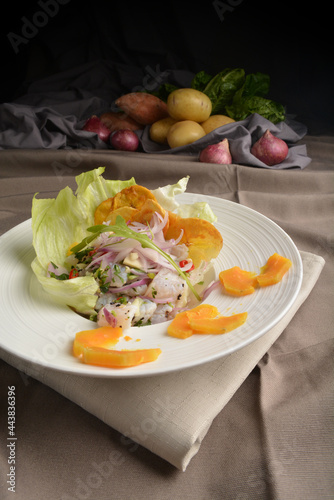 mixed raw smoked fish with fruit and salad dressing appetiser Peruvian cuisine menu