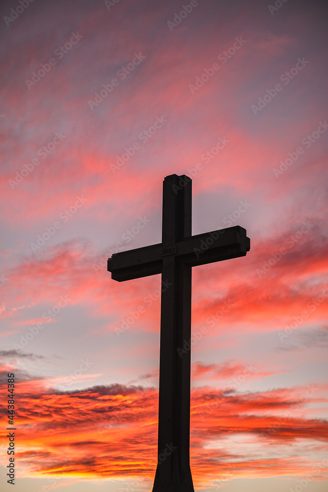 cross against a red sky cross against a red sky