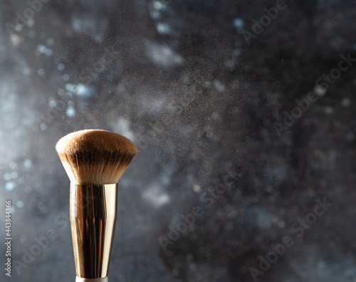 make up brush and powder