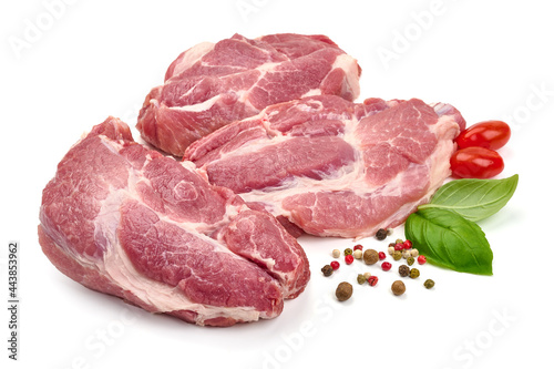 Pork shoulder butt steaks, isolated on white background.