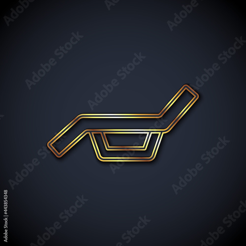 Gold line Sunbed icon isolated on black background. Sun lounger. Vector