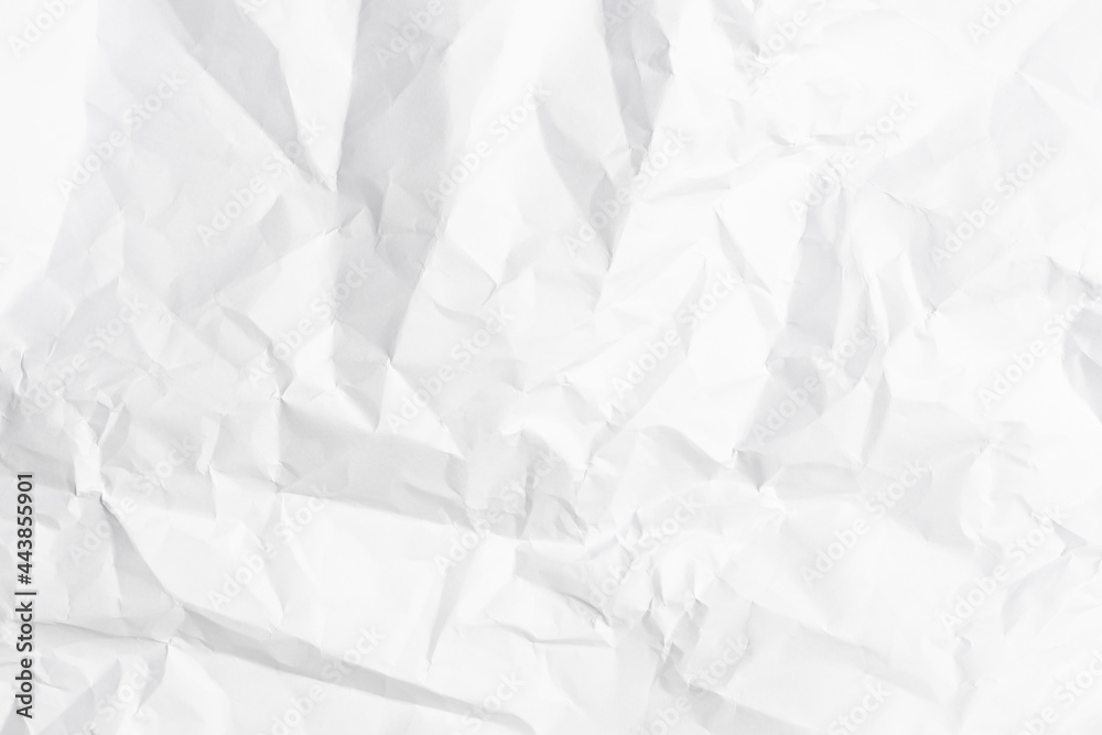Fototapeta premium White crumpled paper texture background.