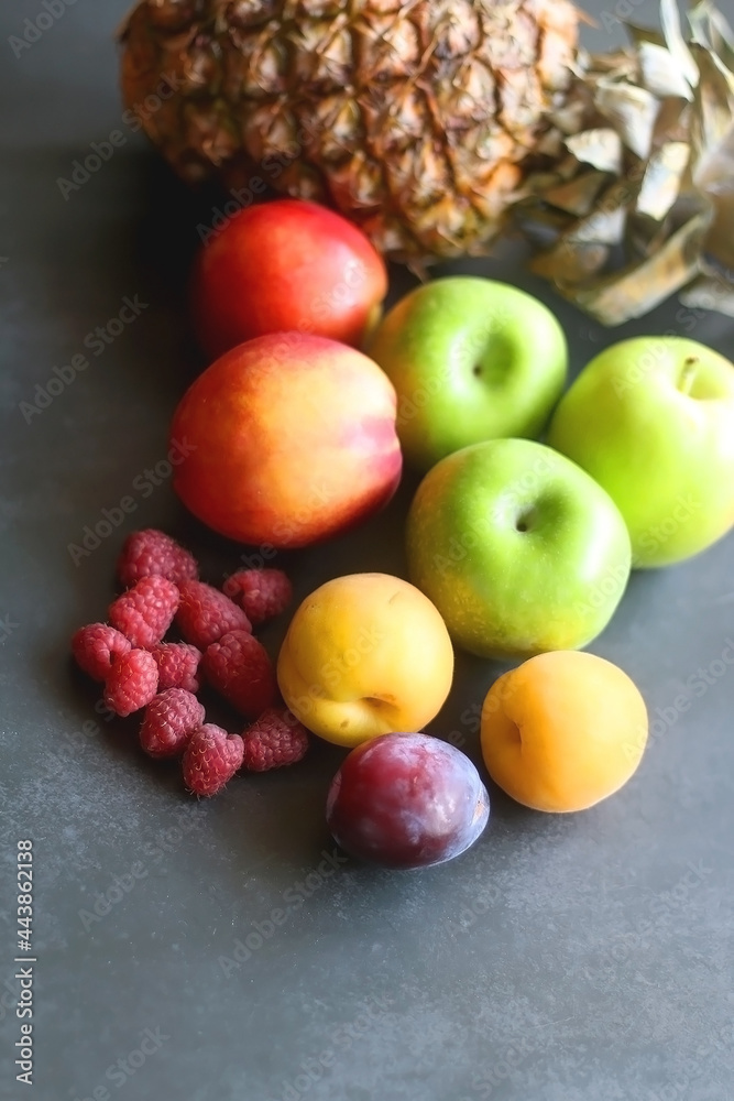 Various colorful fruit on dark background. Selective focus.