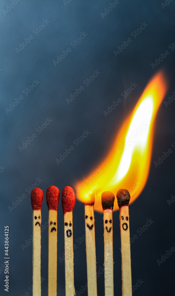 Group of a red match burning isolated with the background. Row burning matchstick in the chain reaction. Matchstick art photography. Group of a red match burning isolated with the background. Row burning matchstick in the chain reaction. Matchstick art photography.