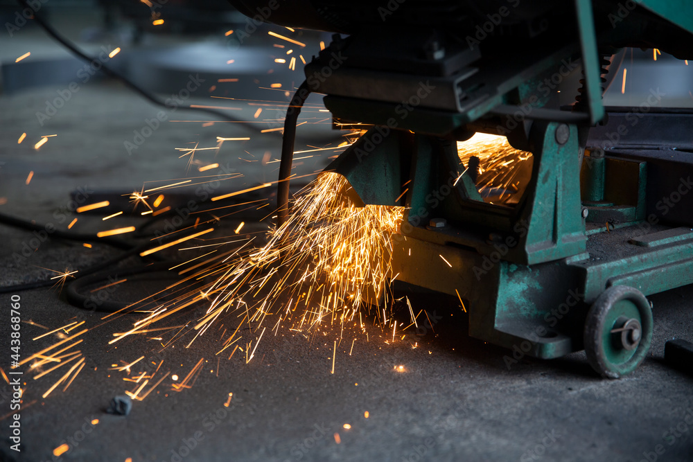 Welder used grinding stone on steel in factory with sparks, Welding ...