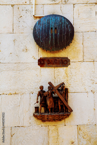 Jerusalem, Israel - June 23, 2021. Station 2: Jesus receives His Cross, on Via Dolorosa - way of grief, a path where Jesus was lead in agony, carrying the crucifixion cross.
