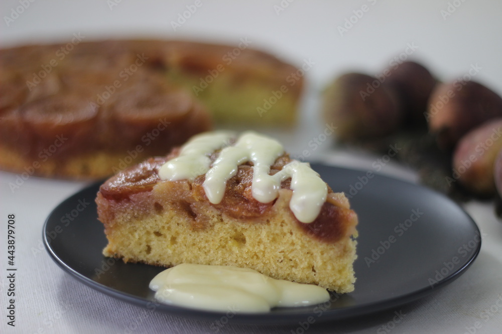Slice of Fig upside down cake with lots of fresh figs and flavored with fresh orange juice. Slice of Fig upside down cake with lots of fresh figs and flavored with fresh orange juice.