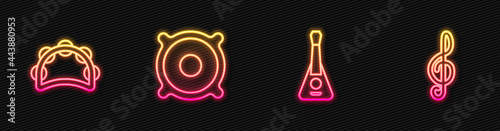 Set line Guitar, Tambourine, Stereo speaker and Treble clef. Glowing neon icon. Vector