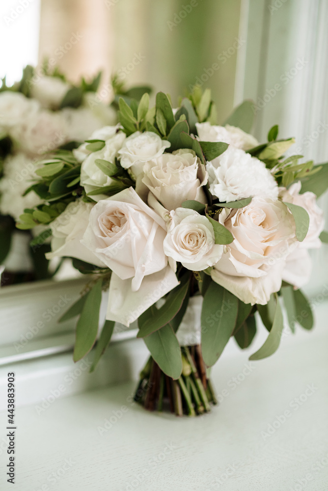 Obraz premium Wedding bouquet with satin and silk ribbons