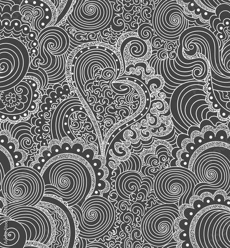 Decorative vector seamless pattern with ornamental handwritten heart and other linear curling ornaments