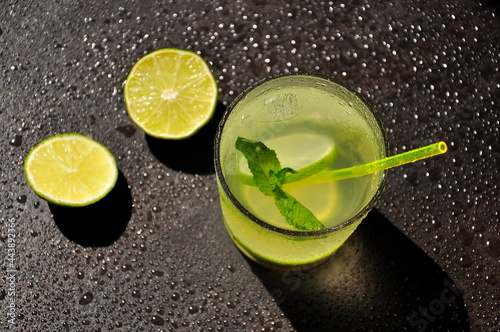 Lemonade in a glass with mint and lime