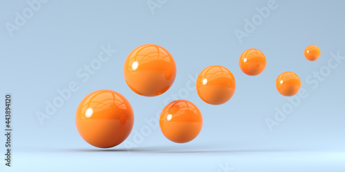 3d render illustration. Falling orange balls in the blue background. Abstraction background for ideas.