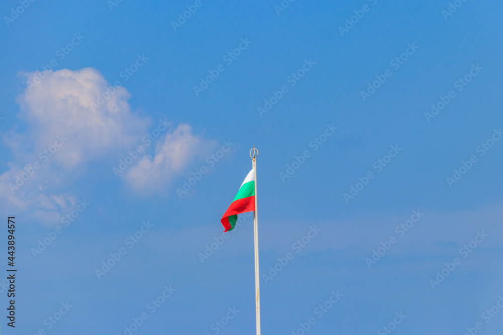 Waving flag of Bulgaria against blue sky