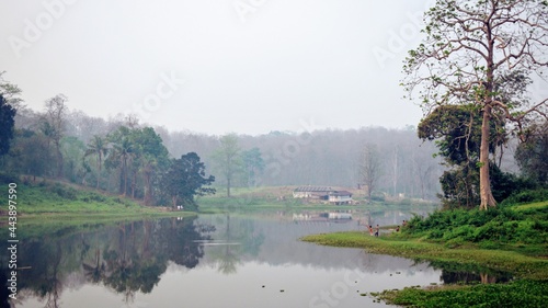 evening on a lake clicked from a train in north east india