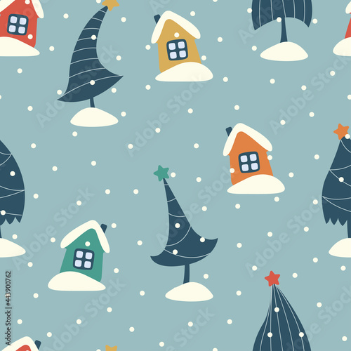 Seamless background with Christmas trees, houses and snowdrifts.