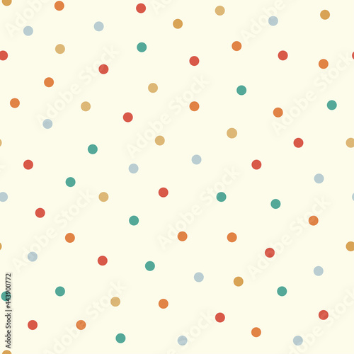 Seamless pattern with multicolored dots. Texture for wrapping paper.