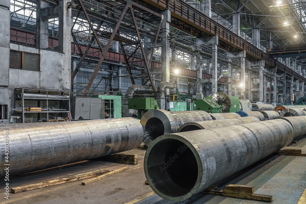 Steel pipes for processing in metal production workshop, metallurgical plant, heavy industry metalwork.