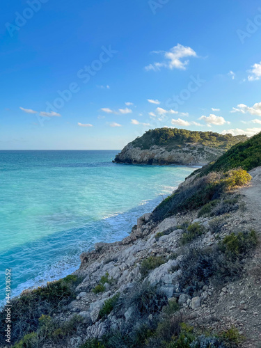 Panorama with sea view. Landscape on the coast from cliffs. Turquoise-colored water with the horizon in the background. © Bruno