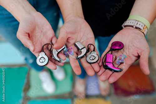 Hands holding cochlear implants  photo