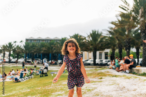 Girl smiling mischievously. 