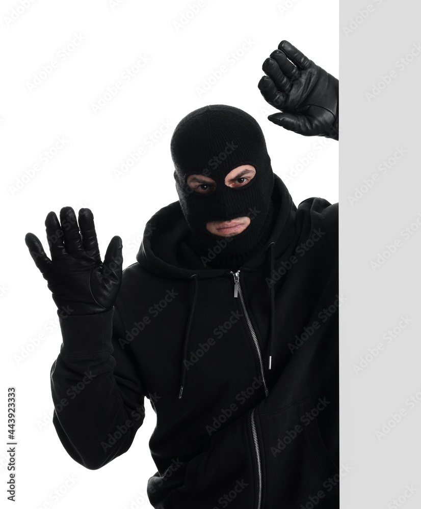 Man wearing black balaclava on white background