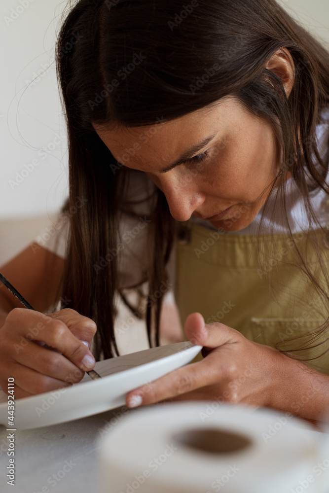 Portrait of a woman artist working Portrait of a woman artist working