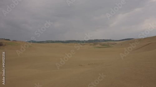 Tottori Sakyu Dunes on an Overcast day. Wide Pan Establishing Shot photo