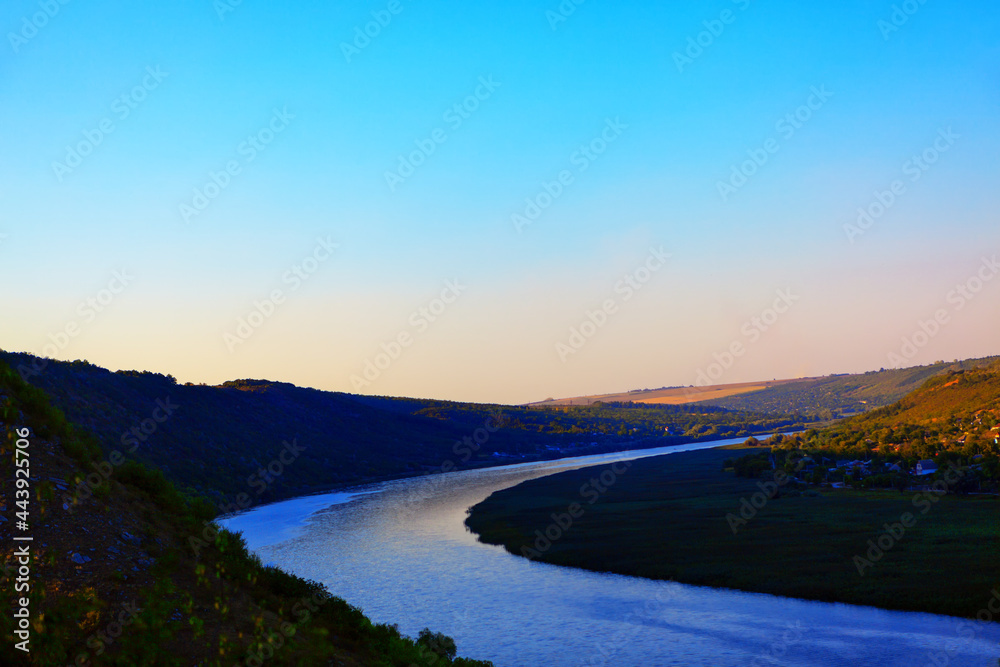 Winding river and hills landscape . River Dnister in Moldova , Tipova riverside