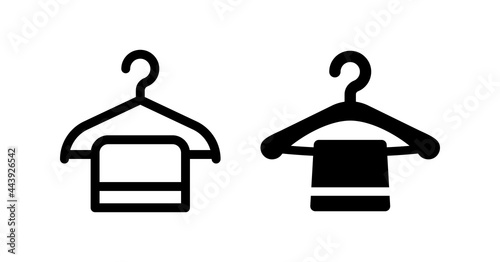 Towel on a hanger icon isolated on white background. Bathroom towel icon.