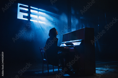 A man playing the piano photo