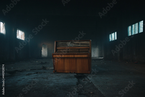 Piano in an old abandoned house photo