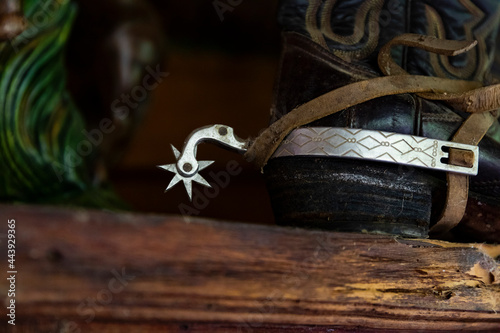 Close Up of Cowboy Boots with Spurs  photo