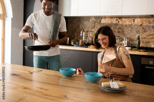 Boyfriend serving food to his girlfriend