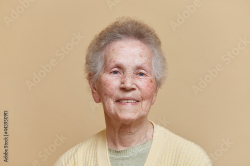 Portrait Of A Smiled Senior Woman   photo