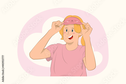 Young sleepy girl took off blindfold eye mask concept