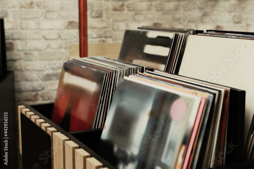 Tableau sur toile Rack with different vinyl records in store