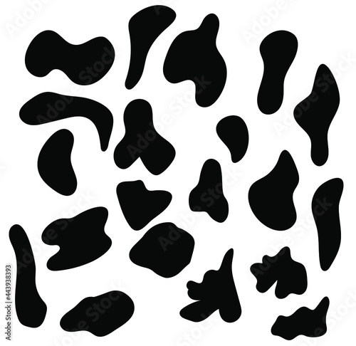 A set of random black spots. The spot is irregular in shape with a simple rounded smooth shape. Vector grunge brush, spots. Abstract brush . Large set of ink blots. Black backdrops, patterns on white