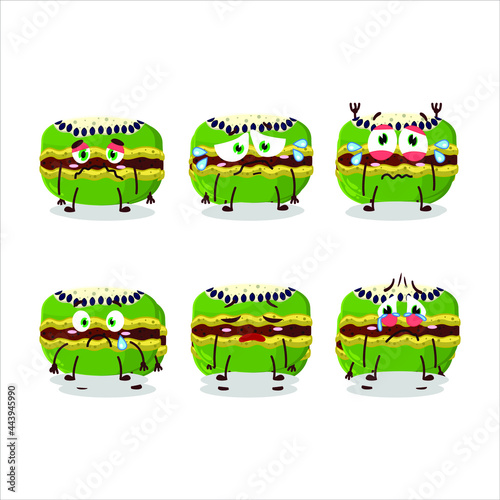 Kiwi macaron cartoon character with sad expression. Vector illustration