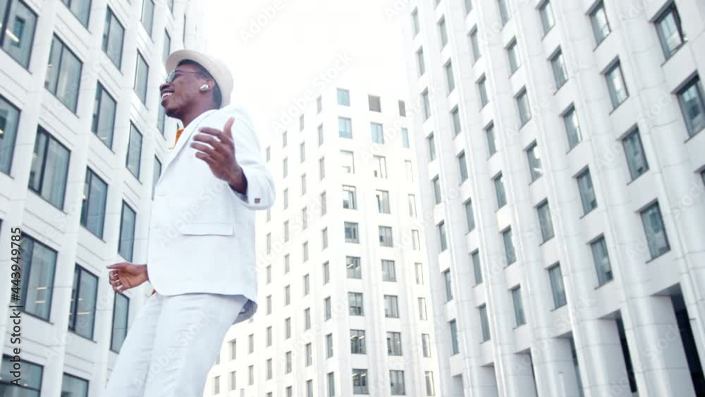 African American performer guy in t shirt and suit dances African American performer guy in t shirt and suit dances