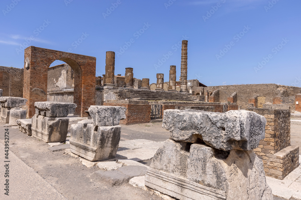 Forum of city destroyed by the eruption of the volcano Vesuvius, view of the Temple of Jupiter, Pompeii, Italy