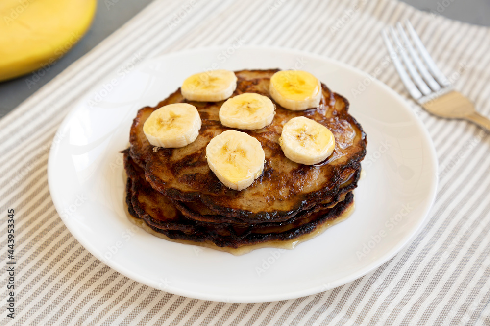 Homemade Banana Pancakes with Honey, low angle view. Close-up. Homemade Banana Pancakes with Honey, low angle view. Close-up.