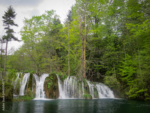 waterfall and lake landscape of Plitvice Lakes National Park  UNESCO natural world heritage and famous travel destination of Croatia. The lakes are located in central Croatia. nature travel background