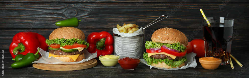 Concept of tasty food with delicious burgers Concept of tasty food with delicious burgers