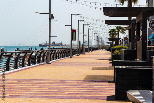 Dubai, UAE - 07.07.2021 - Empty walkway at waterfront market. Outdoors photo