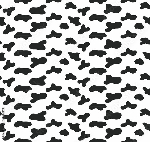 Abstract vector black and white spotted seamless pattern. Black and white spots. Design element for textile, fabric, packaging, paper, packaging, printing and print.