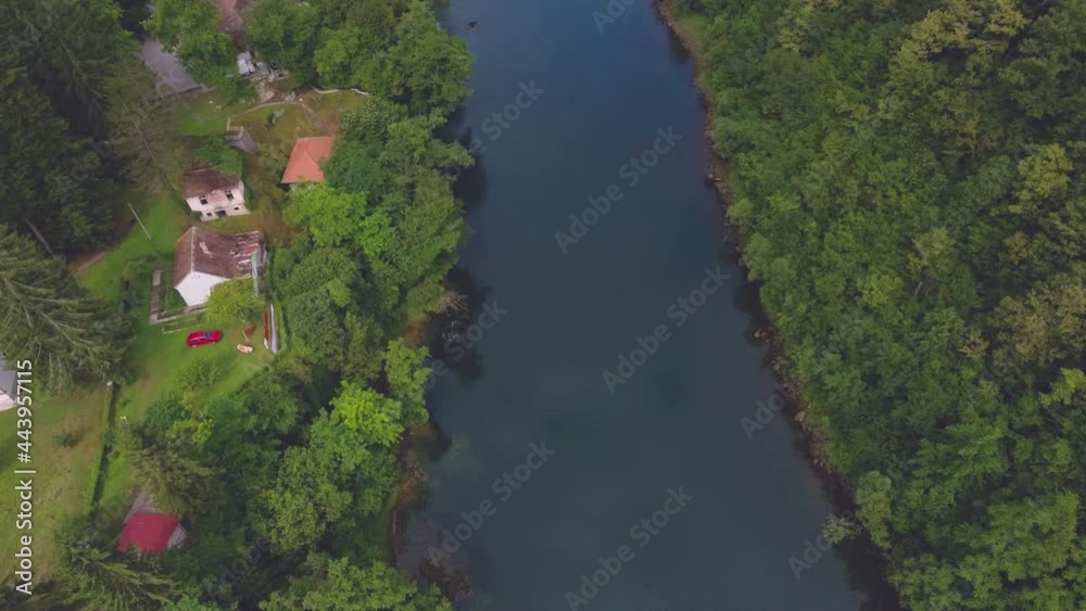 The most cinematic view of a river streaming in the landscape and a community, covered with lush forest and mountains. The most cinematic view of a river streaming in the landscape and a community, covered with lush forest and mountains.