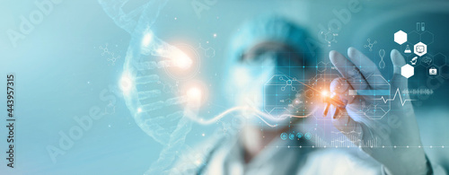 Abstract luminous DNA molecule. Hand of doctor touching and cut dna for checking with analysis chromosome DNA genetic of human on virtual interface. Medicine, Medical science and biotechnology.